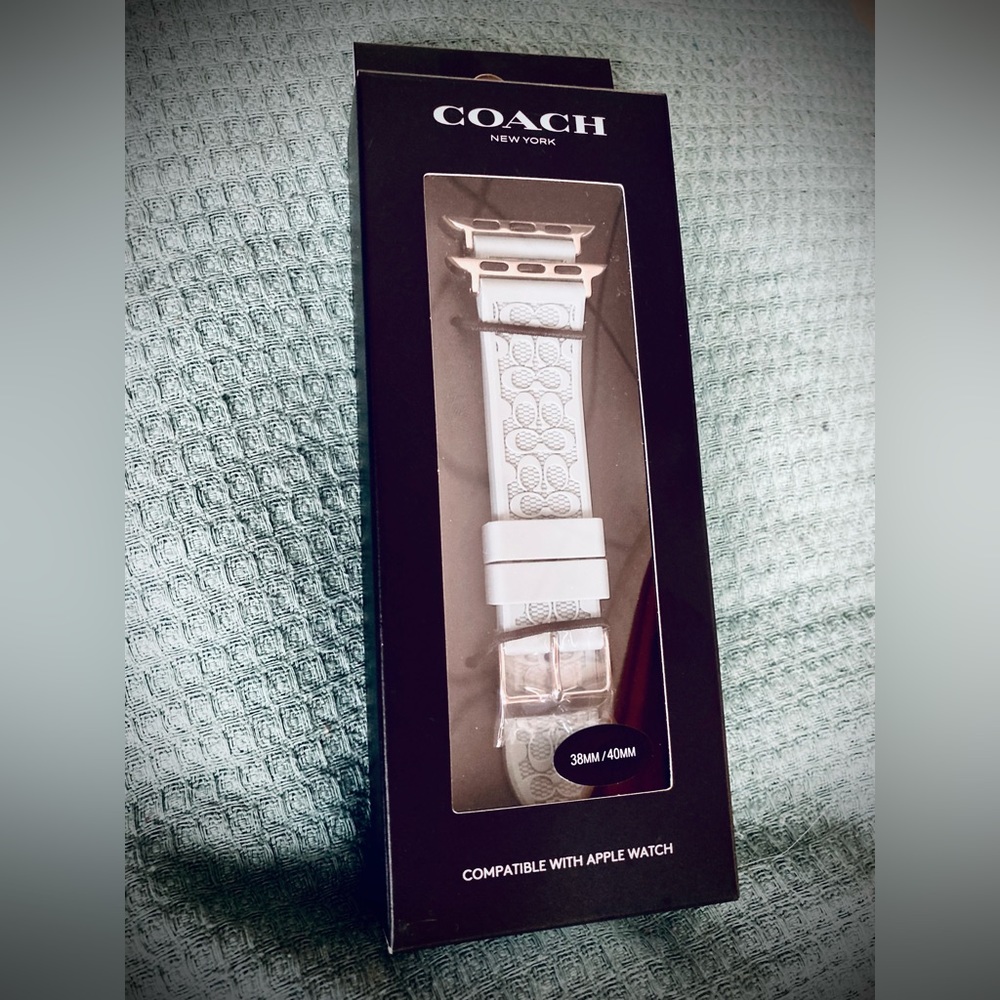 Coach Apple Watch Band. Strap NEW in box. Soft blue, with silver hardware.